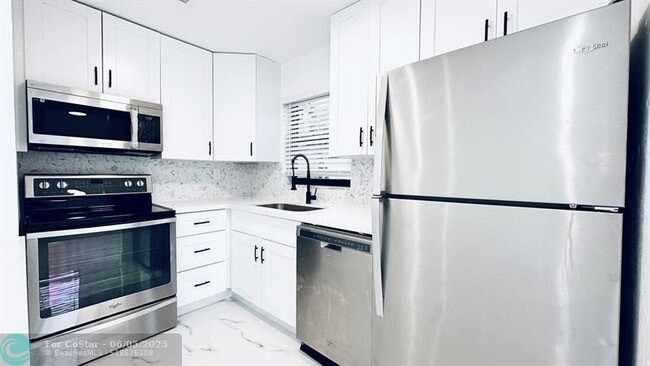 Photo - 1460 NW 22nd Ct Apartment Unit 3