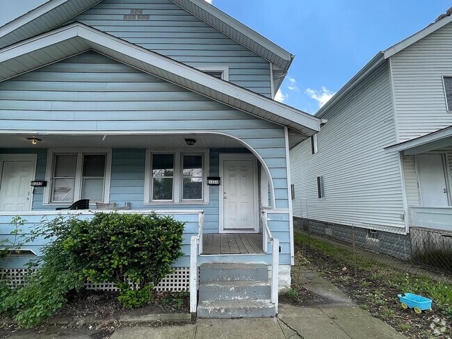 Building Photo - 1261 E 23rd Ave Rental