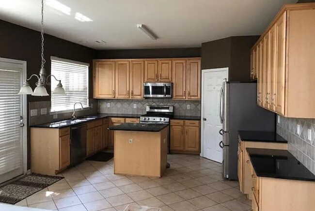 Photo - Coming Soon! 4 BR/2.5BA | 2,600+sqft Single Family Home | Grand Living Area w/ Fireplace