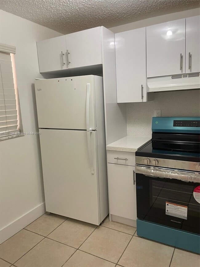 Building Photo - 11307 SW 200th St Unit 108-B Rental