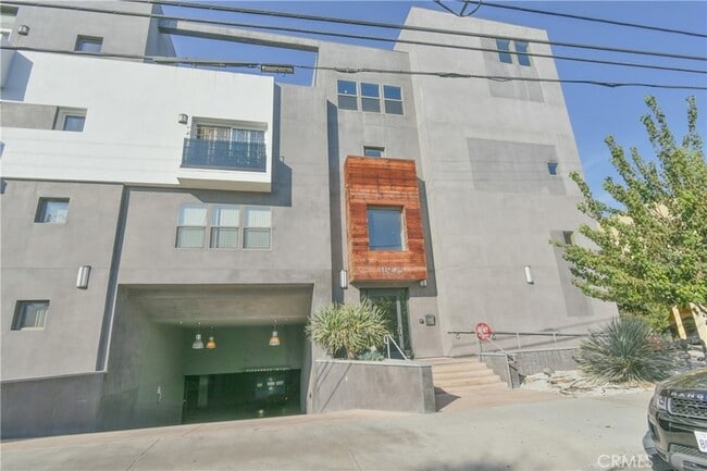 Building Photo - 11925 Kling St Unit 206