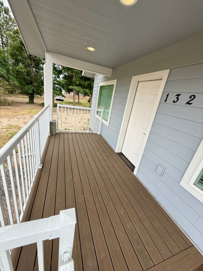 Photo - Spacious 4-Bedroom Home with Detached Garage & Large Yard in Clarkston