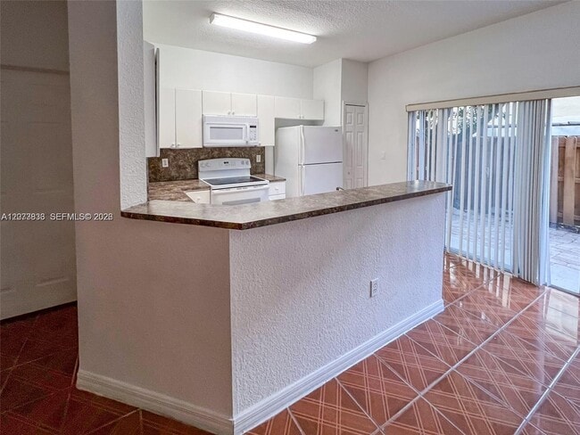 Building Photo - 8245 NW 108th Ave Unit 8-15