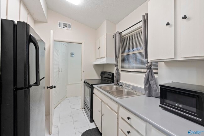 Photo - 2014 Colony Dr SW Unit NA