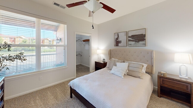 Your bedroom is a cozy place, complete with ample light and space.