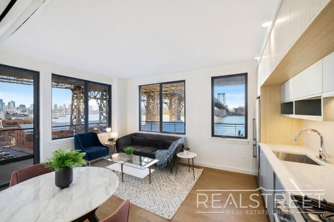 Photo - NO FEE Luxury Waterfront 2 Bedroom with wrap around terrace! Unit 2B