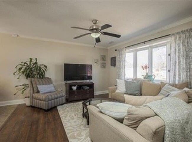 Photo - {5611} Updated OP Ranch + Two Car Garage + Fenced Yard and Stamped Concrete Patio Perfect for Spr...