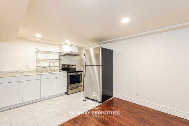 Photo - Well-Maintained 4 Bed / 2 Bath Single-Family Home with Separate Mother-In-Law Apartment – South S...