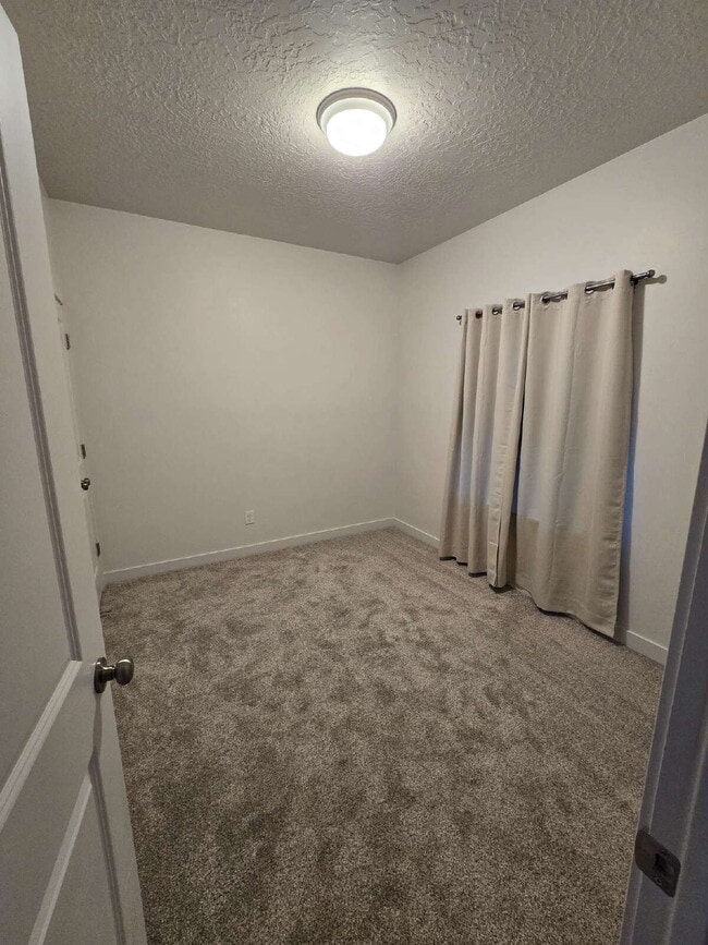 Photo - "Chic 3-Bed Townhouse with Pool Access in Bluffdale!"