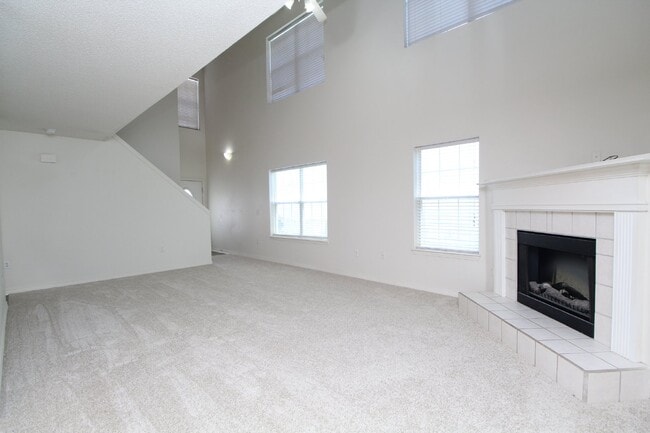 Photo - Modern 3-Bedroom Two-Story Home Featuring 2-Car Garage, Open Great Room with Fireplace, Private P...