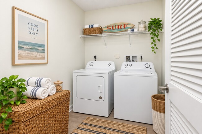 Unwind in the convenience of Quantum Lake Villas, featuring an elegant laundry room equipped with modern appliances. Enjoy a seamless blend of comfort and style in a thoughtfully designed space. Take the next step and elevate your living today!