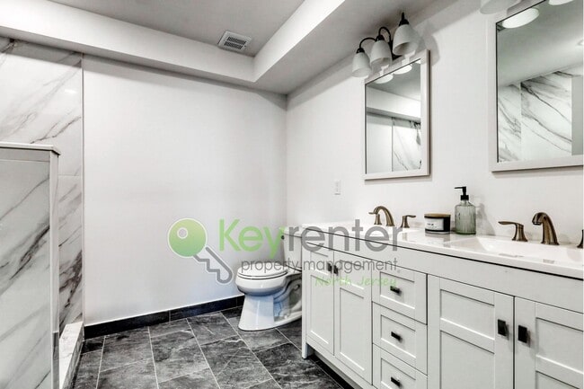 Photo - Modern New Construction 2 Bedroom Townhome with Garage & Driveway — First Occupancy!