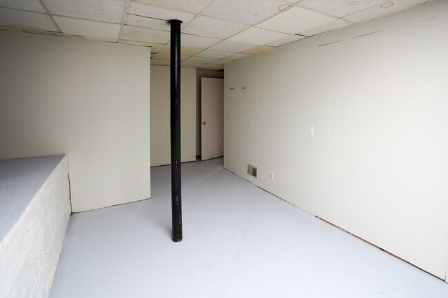Storage room, or exercise room, adjacent to lower living room. - 1489 North Highland Avenue Northeast Townhome