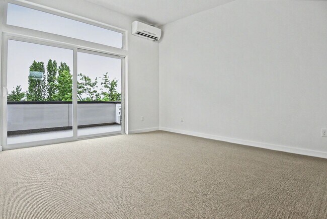 Photo - AVAILABLE AUGUST 14th! Modern Townhome w/ Private Balcony, AC, & Reserved Parking in Central Area