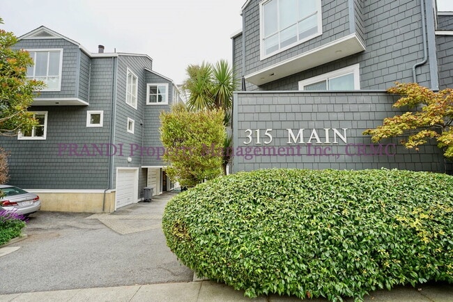 Photo - Wood burning fireplace in this updated 2 b... Unit Apt 2
