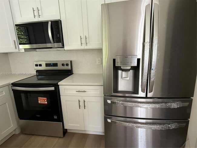 Photo - Woodgate Court, Sunrise, FL 33326 - 3 BR 2 BA villa