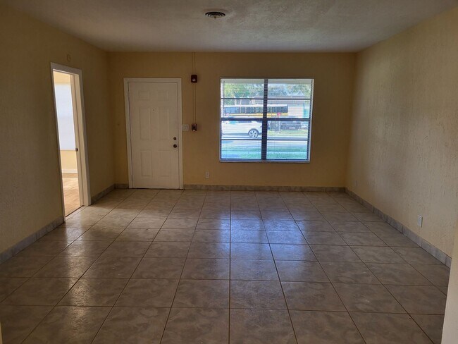 Photo - Renovated 4/2.5 Home with garage and large private backyard