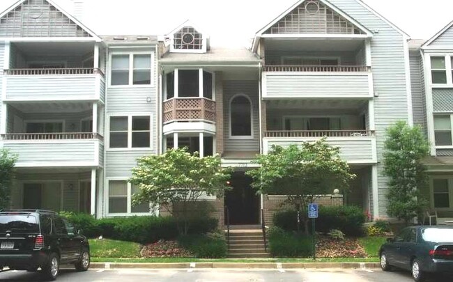 Front of condo building - 7713 Lafayette Forest Dr Condo Unit 12