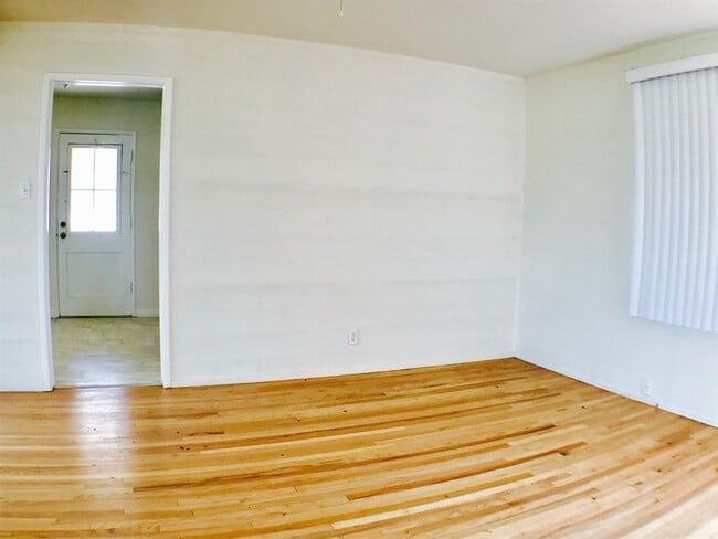 Photo - Minutes drive to the beach Hardwood flooring all throughout Large Deck with a Yard
