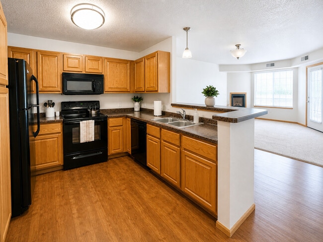 1 dormitorio con cocina - Edgewater Apartments