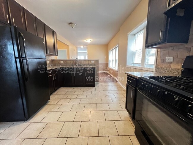 Photo - 9016 S Justine St Unit 1