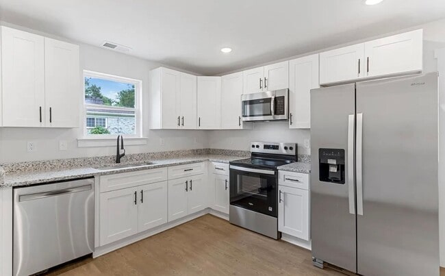 Photo - Brand New 3/2.5 Duplex Available Now!