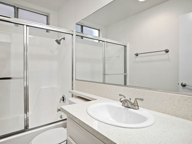 Modern styled bathroom with shower and tub. - 10620 NoHo