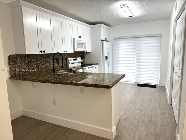 Photo - 3375 W 76th St Unit 102