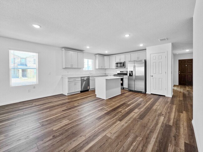 Photo - Brand New 4BR 3BA Home w/ Quartz Kitchen • 2-Car Garage • Fenced Yard in Elizabeth Creek