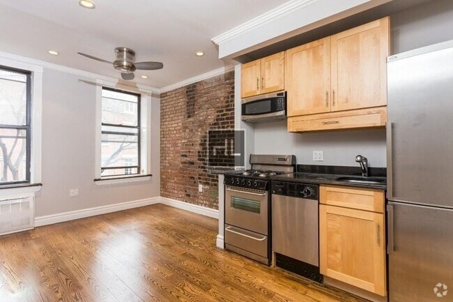 Building Photo - E 9TH ST. Rental