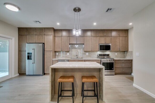 Building Photo - Fully Remodeled Corner-Lot Home with Dual Primary Suites & Private Patio