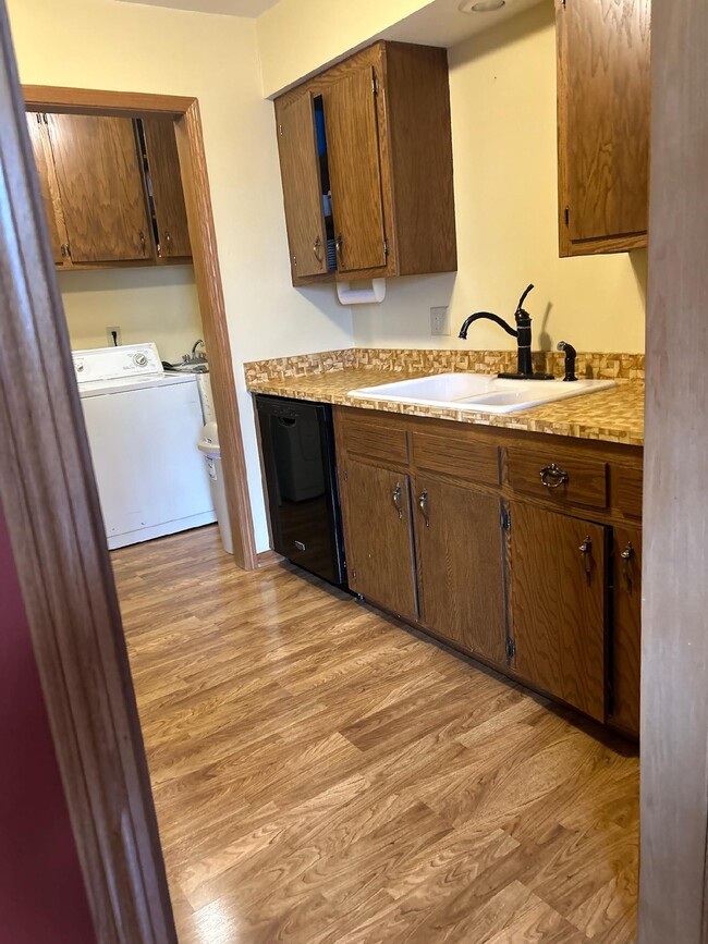 Kitchen w/view of washer and dryer - 524 Marshal Ct Unit B