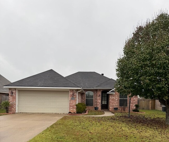 Building Photo - Haughton! Charming 3-Bedroom Brick Home with Spacious Yard