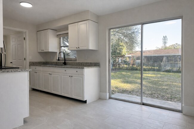 Photo - Beautifully Fully Remodeled 3-Bedroom Home with Carport, Indoor Laundry & Huge Fenced Yard!
