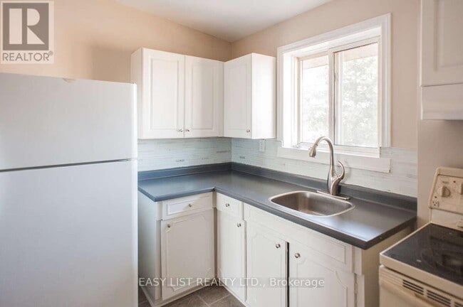 Photo - 8650 Wyandotte St E Unité 34