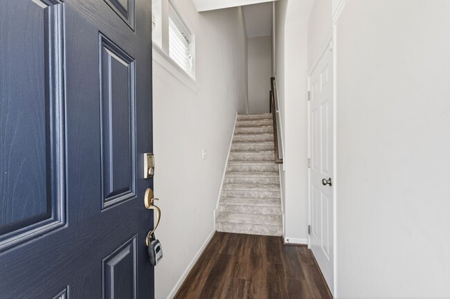 Photo - Beautiful 4BR End-Unit Townhome in Prime Apex Location!