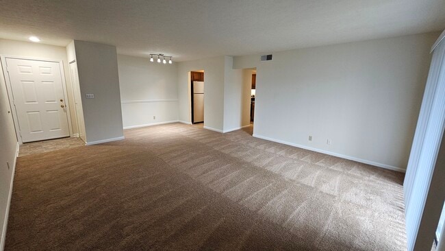 2BR, 2BA - 1100 SF - Living Room - Plaza Square Apartments