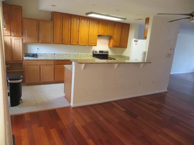 MAIN: Dining area looking into kitchen: Open space! - 7039 Chesley Search Way