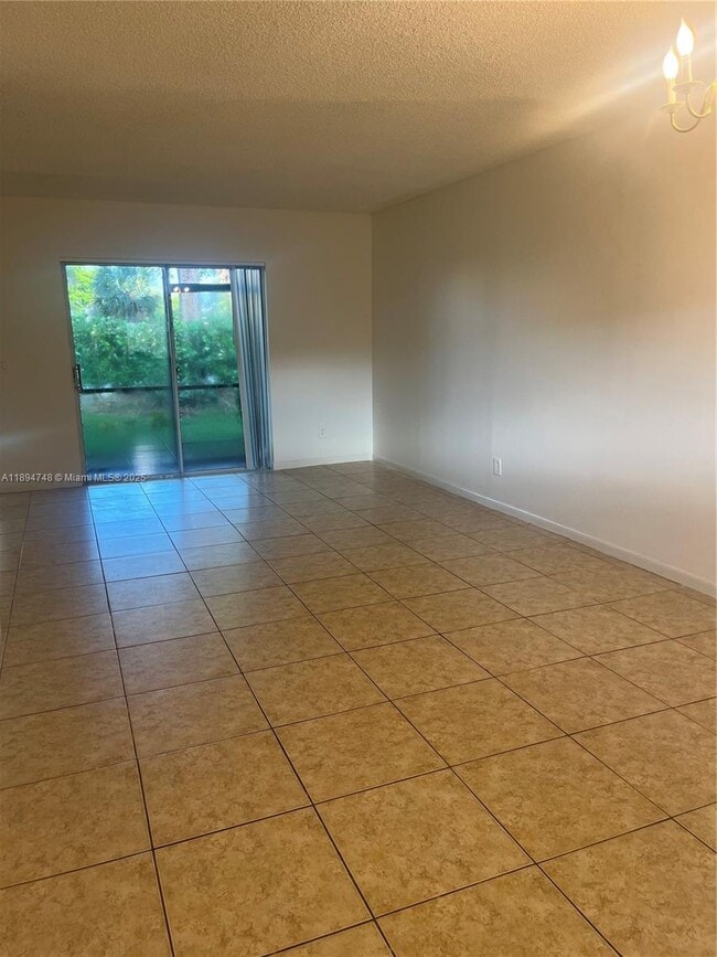 Building Photo - 725 NW 103rd Terrace Unit 101