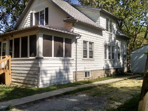 Esquina sudoeste del porche frontal - 1306 Hickory St Casa