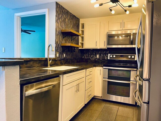 Photo - Partly Furnished 3-bedroom, 3-bath condo a...