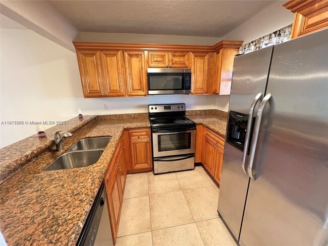 Building Photo - 1501 Windorah Way Unit A