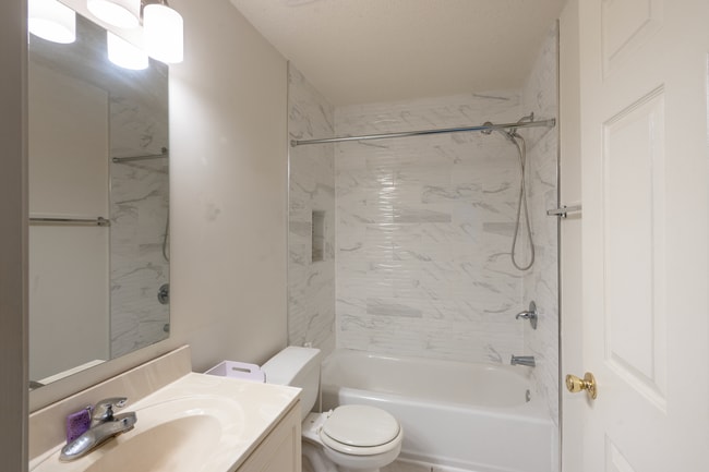 1 of 2 Bathrooms - 10024 Vanderbilt Cir Unit 1