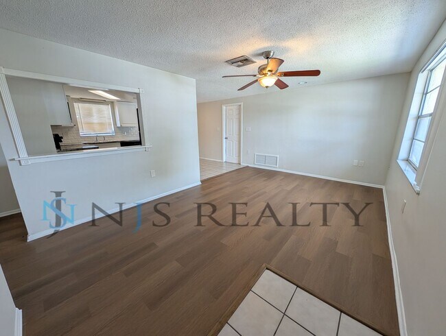 Photo - 3 bed,2 bath ~ With garage, workshop & shed!! NEW floors, NEW paint! Updated bathroom & kitchen w...