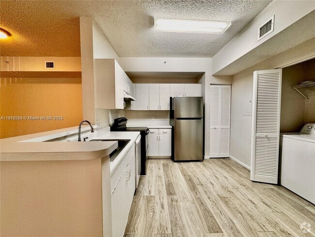 Building Photo - 6968 SW 39th St Unit F107 Rental