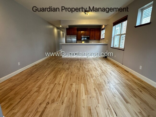 Building Photo - Spacious Uptown Side By Side, Dishwasher, ...