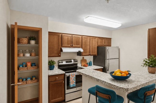 Modern kitchen in the 2x2 Deluxe at Tudor Village at the Mall Apartments. - Tudor Village at the Mall Apartments