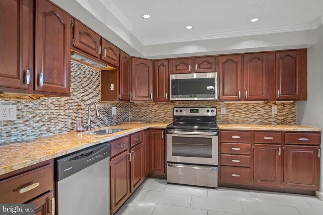 Photo - Conveniently Located Townhouse with Versatile Living Spaces
