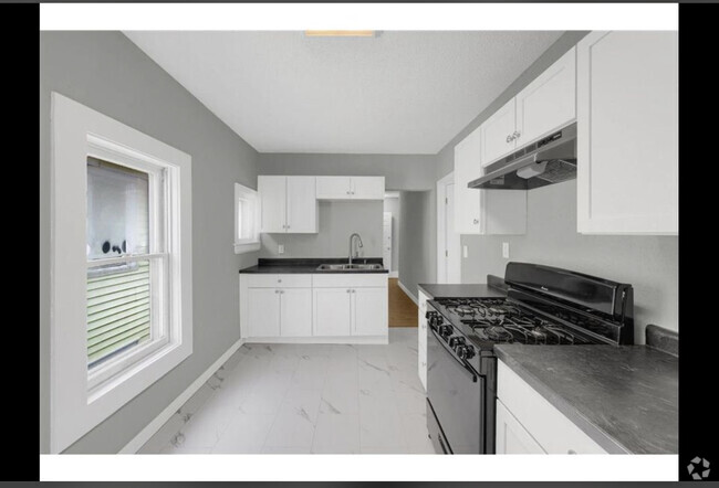 Building Photo - 1055 7th St W Unit 2 bedroom 1 bath deck Rental