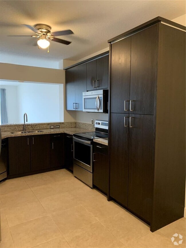 Building Photo - 10730 NW 66th St Unit 305 Rental